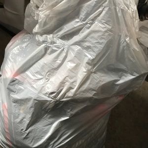 Full bag of size small clothes for sale